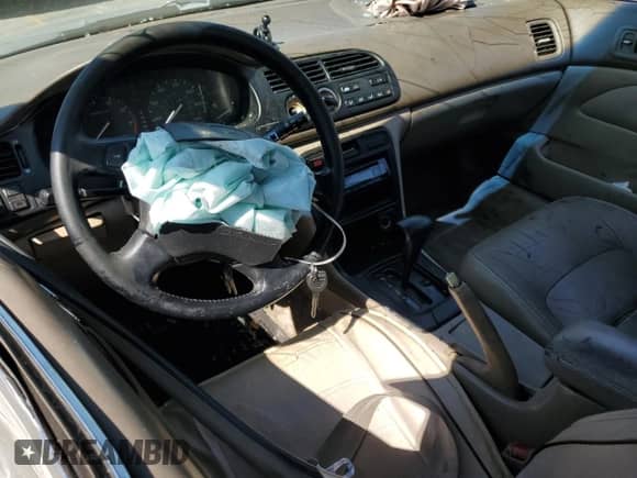 1996 Honda Accord EX with VIN 1HGCD7268TA017611, listed as a Copart auction lot 81402235 with 306,366 mi miles and Salvage title. Bid and sale history available at DreamBid. Image 8.