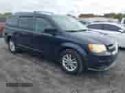 2014 Dodge Grand Caravan SXT with VIN 2C4RDGCG3ER120658, listed as a IAAI auction lot 43410504 with 127,124 mi miles and . Bid and sale history available at DreamBid. Image 1.