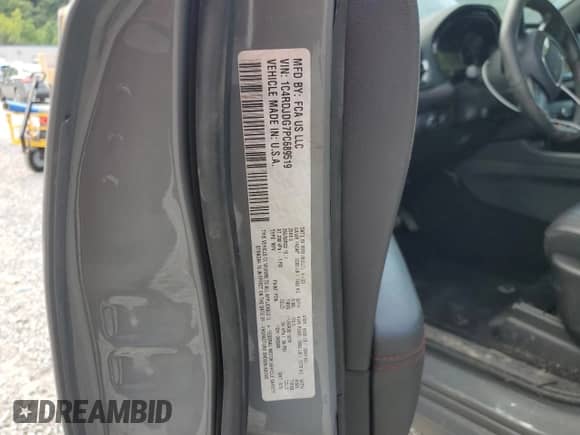 2023 Dodge Durango GT z VIN 1C4RDJDG7PC689519, wystawiony jako Copart lot #63975025 z przebiegiem 54 232 mil mil oraz Szkoda całkowita • Salvage title. Historia ofert i sprzedaży dostępna na DreamBid. Obrazek 13.