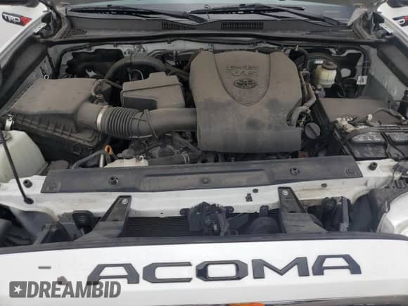 2017 Toyota Tacoma SR5 z VIN 5TFRZ5CN7HX023988, wystawiony jako Copart lot #70519005 z przebiegiem 70 342 mil mil oraz Szkoda całkowita • Salvage title. Historia ofert i sprzedaży dostępna na DreamBid. Obrazek 11.