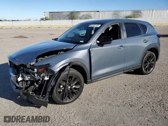 2024 Mazda CX-5 S Carbon Edition z VIN JM3KFBCM6R0350318, wystawiony jako Copart lot #85782105 z przebiegiem 30 350 mil mil oraz Szkoda całkowita • Salvage title. Historia ofert i sprzedaży dostępna na DreamBid. Obrazek 1.