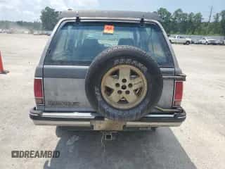 1991 Chevrolet Blazer z VIN 1GNCT18ZXM8187209, wystawiony jako Copart lot #65434985 z przebiegiem 128 662 mil mil oraz Szkoda całkowita • Salvage title. Historia ofert i sprzedaży dostępna na DreamBid. Obrazek 6.