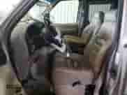 2002 Ford Econoline Cargo Recreational with VIN 1FDRE14W32HB64467, listed as a Copart auction lot 81878595 with 139,517 mi miles and Salvage title. Bid and sale history available at DreamBid. Image 7.