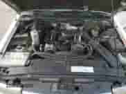 1999 Chevrolet Blazer LS z VIN 1GNCS13W1X2162495, wystawiony jako Copart lot #80019274 z przebiegiem Nie podano mil oraz Szkoda całkowita • Salvage title. Historia ofert i sprzedaży dostępna na DreamBid. Obrazek 11.