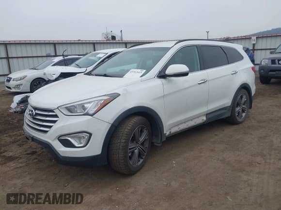 2014 Hyundai Santa Fe Limited z VIN KM8SNDHF9EU071221, wystawiony jako IAAI lot #43312415 z przebiegiem 152 481 mil mil oraz . Historia ofert i sprzedaży dostępna na DreamBid. Obrazek 2.