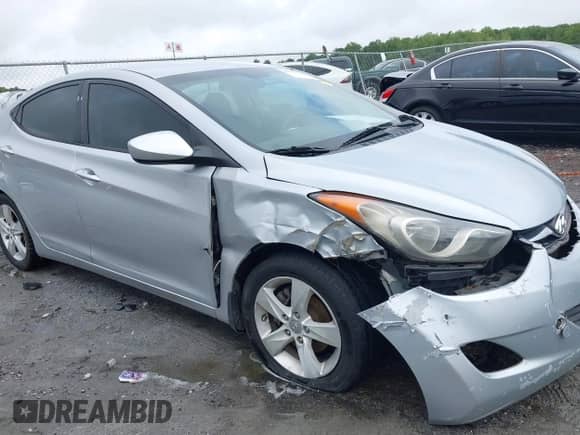 2012 Hyundai Elantra Limited z VIN 5NPDH4AE1CH147141, wystawiony jako IAAI lot #42965318 z przebiegiem 169 274 mil mil oraz . Historia ofert i sprzedaży dostępna na DreamBid. Obrazek 6.