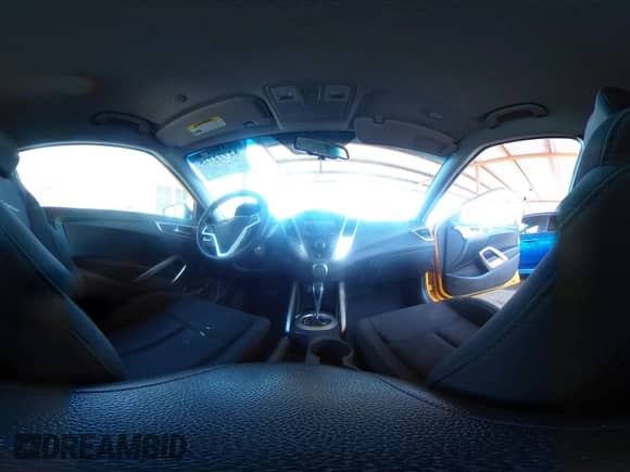 2013 Hyundai Veloster w/Black Int z VIN KMHTC6AD6DU094792, wystawiony jako IAAI lot #42772775 z przebiegiem 108 643 mil mil oraz . Historia ofert i sprzedaży dostępna na DreamBid. Obrazek 18.