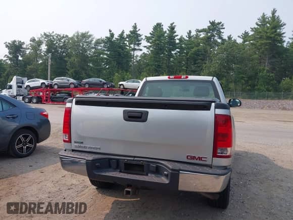 2011 GMC Sierra 1500 Work Truck z VIN 1GTN2TEA6BZ184958, wystawiony jako IAAI lot #42874958 z przebiegiem 63 439 mil mil oraz . Historia ofert i sprzedaży dostępna na DreamBid. Obrazek 16.