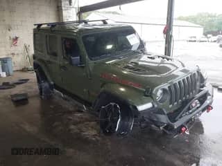 2021 Jeep Wrangler Unlimited Rubicon with VIN 1C4HJXFG4MW543254, listed as a IAAI auction lot 42316180 with 50,696 mi miles and . Bid and sale history available at DreamBid. Image 1.