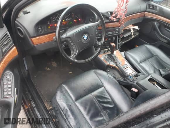 1999 BMW 5 Series 528i с VIN WBADM6337XBY33191, выставлен на аукционе Copart как лот 82470594 с пробегом 145 691 миль миль и На запчасти • Non repairable. История ставок и продаж доступна на DreamBid. Изображение 8.