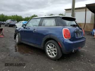 2016 MINI Hardtop with VIN WMWXP5C58G3B76219, listed as a Copart auction lot 57879225 with 94,245 mi miles and Salvage title. Bid and sale history available at DreamBid. Image 2.
