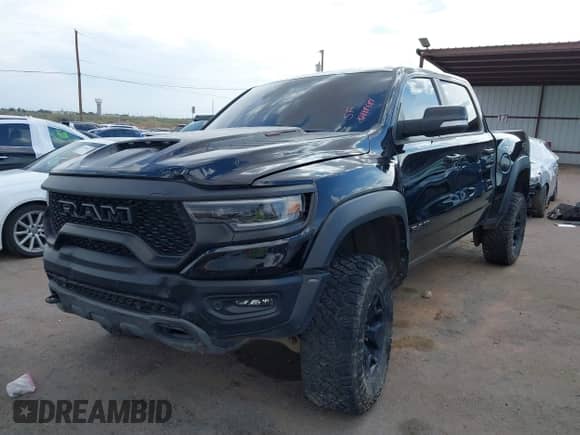 2022 Ram 1500 TRX with VIN 1C6SRFU90NN103186, listed as a IAAI auction lot 42888581 with 53,781 mi miles and . Bid and sale history available at DreamBid. Image 18.