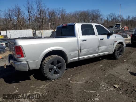 2014 Ram 1500 Laramie z VIN 1C6RR7VM8ES434719, wystawiony jako Copart lot #47923295 z przebiegiem 145 546 mil mil oraz Szkoda całkowita • Salvage title. Historia ofert i sprzedaży dostępna na DreamBid. Obrazek 3.