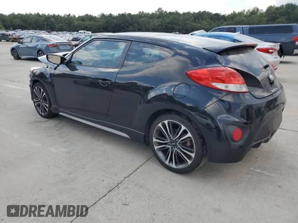 2016 Hyundai Veloster Turbo с VIN KMHTC6AE2GU258813, выставлен на аукционе Copart как лот 71420535 с пробегом 144 451 миль миль и Списание • Salvage title. История ставок и продаж доступна на DreamBid. Изображение 2.