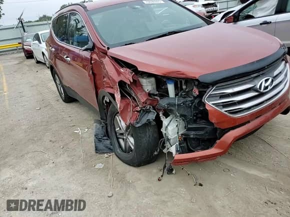 2017 Hyundai Santa Fe 2.4L с VIN 5XYZUDLB8HG487843, выставлен на аукционе Copart как лот 70696665 с пробегом 153 548 миль миль и Списание • Salvage title. История ставок и продаж доступна на DreamBid. Изображение 14.