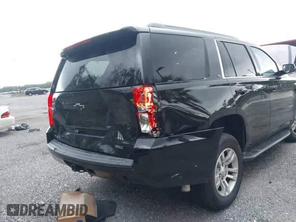 2020 Chevrolet Tahoe LT with VIN 1GNSCBKC1LR182348, listed as a IAAI auction lot 42321890 with 72,452 mi miles and . Bid and sale history available at DreamBid. Image 12.
