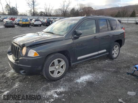 2010 Jeep Compass Latitude с VIN 1J4NF1FB0AD675869, выставлен на аукционе Copart как лот 83742284 с пробегом 167 564 миль миль и Списание • Salvage title. История ставок и продаж доступна на DreamBid. Изображение 1.