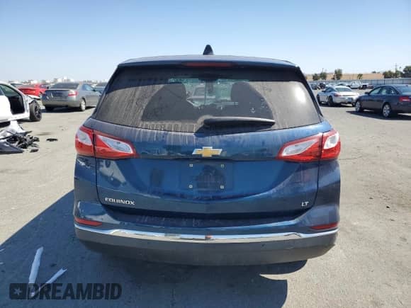 2020 Chevrolet Equinox LT с VIN 2GNAXJEVXL6196042, выставлен на аукционе Copart как лот 81743035 с пробегом 74 987 миль миль и Списание • Salvage title. История ставок и продаж доступна на DreamBid. Изображение 6.