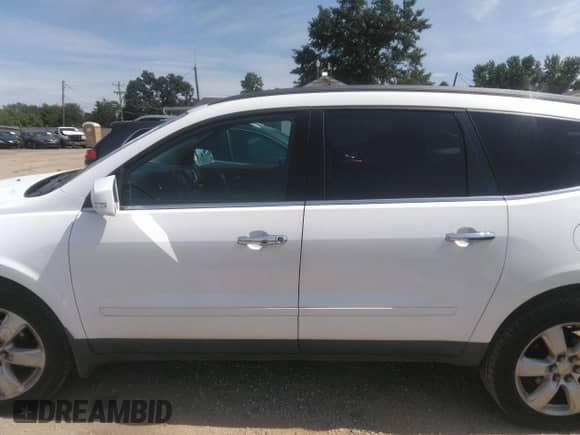 2016 Chevrolet Traverse LT with VIN 1GNKRGKD2GJ260760, listed as a IAAI auction lot 43087832 with 162,048 mi miles and . Bid and sale history available at DreamBid. Image 14.