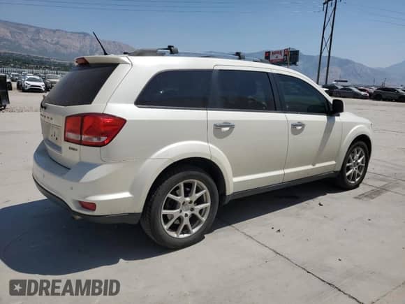 2012 Dodge Journey Crew with VIN 3C4PDDDG9CT361977, listed as a Copart auction lot 67773455 with 168,223 mi miles and Salvage title. Bid and sale history available at DreamBid. Image 3.