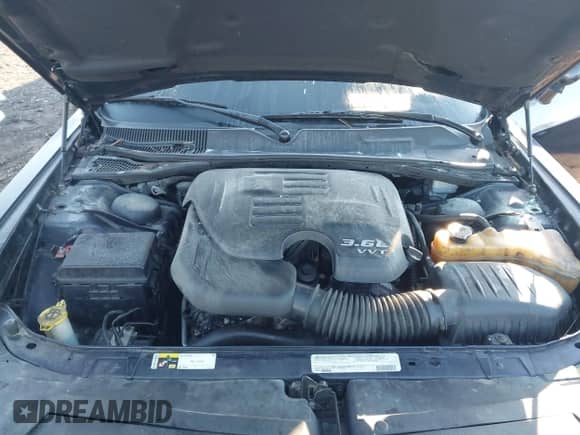 2012 Dodge Challenger SXT z VIN 2C3CDYAG2CH291147, wystawiony jako IAAI lot #43390816 z przebiegiem 200 643 mil mil oraz . Historia ofert i sprzedaży dostępna na DreamBid. Obrazek 10.