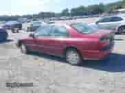 1996 Honda Accord LX z VIN 1HGCD5633TA077784, wystawiony jako IAAI lot #43302358 z przebiegiem 235 003 mil mil oraz . Historia ofert i sprzedaży dostępna na DreamBid. Obrazek 3.