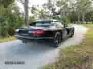 2000 Dodge Viper RT/10 with VIN 1B3ER65E9YV604682, listed as a Copart auction lot 87103775 with 56,029 mi miles and Clean title. Bid and sale history available at DreamBid. Image 4.