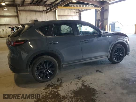 2024 Mazda CX-5 S Carbon Edition z VIN JM3KFBCL2R0408870, wystawiony jako Copart lot #64036385 z przebiegiem 19 874 mil mil oraz Szkoda całkowita • Salvage title. Historia ofert i sprzedaży dostępna na DreamBid. Obrazek 3.