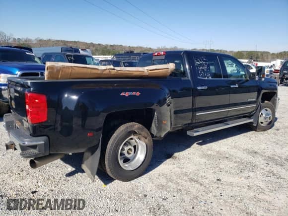 2015 Chevrolet Silverado 3500HD LTZ с VIN 1GC4K0E81FF532664, выставлен на аукционе Copart как лот 45182145 с пробегом 97 615 миль миль и Списание • Salvage title. История ставок и продаж доступна на DreamBid. Изображение 3.