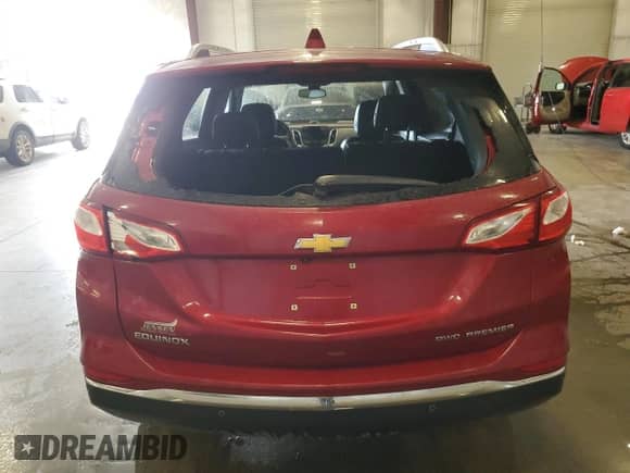 2020 Chevrolet Equinox Premier с VIN 3GNAXXEV5LS539148, выставлен на аукционе Copart как лот 70192185 с пробегом 76 001 миль миль и Списание • Salvage title. История ставок и продаж доступна на DreamBid. Изображение 6.