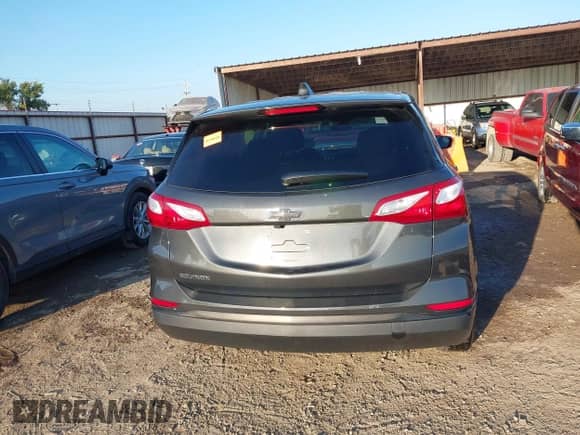 2021 Chevrolet Equinox LS z VIN 2GNAXHEV1M6123832, wystawiony jako IAAI lot #43411817 z przebiegiem 105 062 mil mil oraz . Historia ofert i sprzedaży dostępna na DreamBid. Obrazek 17.