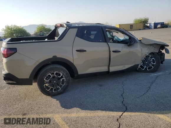 2024 Hyundai Santa Cruz SEL with VIN 5NTJBDAE3RH086082, listed as a Copart auction lot 70337094 with 12,598 mi miles and Salvage title. Bid and sale history available at DreamBid. Image 3.