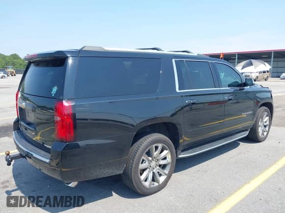 2019 Chevrolet Suburban Premier with VIN 1GNSCJKC5KR304766, listed as a IAAI auction lot 42410264 with 105,171 mi miles and . Bid and sale history available at DreamBid. Image 4.