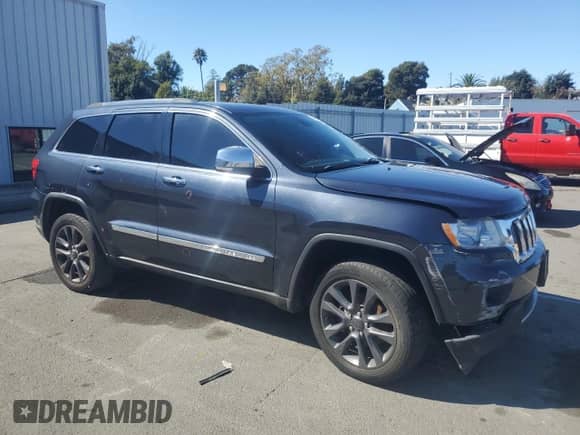 2013 Jeep Grand Cherokee Limited with VIN 1C4RJFBG1DC638666, listed as a Copart auction lot 85532785 with 210,478 mi miles and Clean title. Bid and sale history available at DreamBid. Image 4.