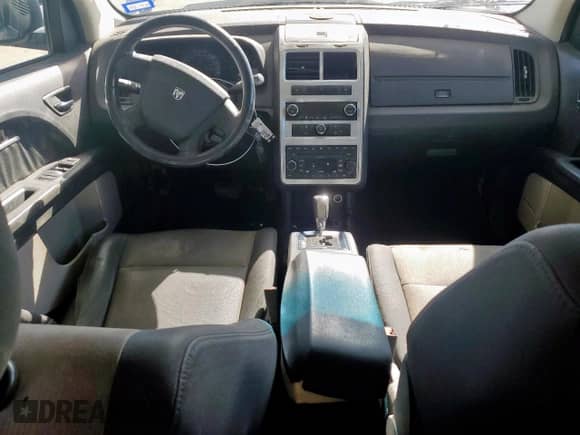 2009 Dodge Journey SXT с VIN 3D4GG57V59T241760, выставлен на аукционе Copart как лот 80456025 с пробегом 212 459 миль миль и Списание • Salvage title. История ставок и продаж доступна на DreamBid. Изображение 8.