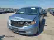 2012 Honda Odyssey Touring with VIN 5FNRL5H97CB130670, listed as a IAAI auction lot 43438076 with 198,047 mi miles and . Bid and sale history available at DreamBid. Image 2.