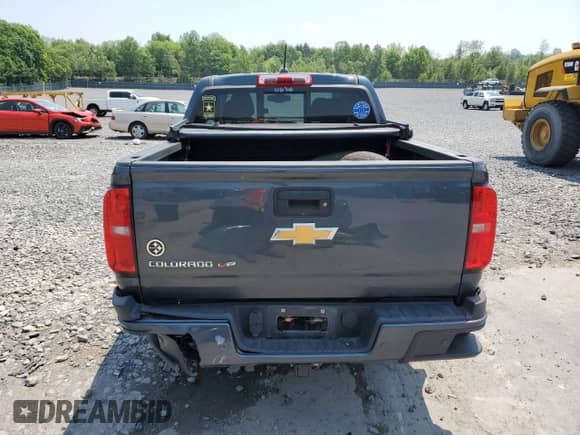 2020 Chevrolet Colorado 4WD Z71 z VIN 1GCGTDEN8L1139700, wystawiony jako Copart lot #59801195 z przebiegiem 80 882 mil mil oraz Szkoda całkowita • Salvage title. Historia ofert i sprzedaży dostępna na DreamBid. Obrazek 6.