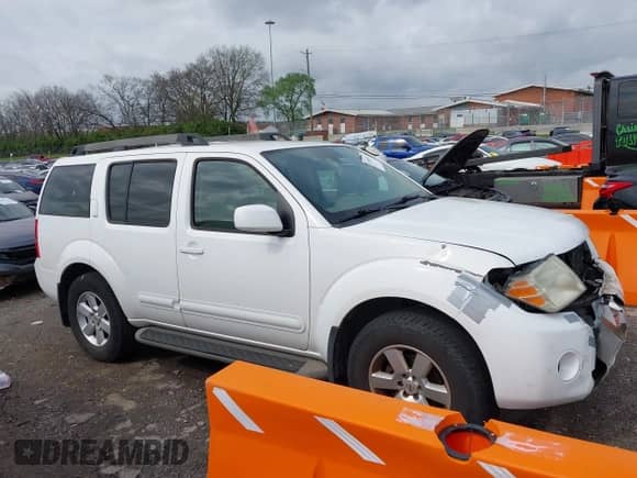 2012 Nissan Pathfinder SV with VIN 5N1AR1NN4CC607893, listed as a IAAI auction lot 41942452 with 200,937 mi miles and . Bid and sale history available at DreamBid. Image 14.