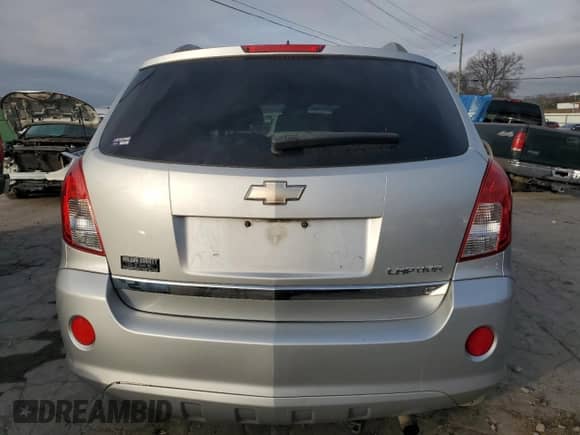 2014 Chevrolet Captiva Sport LT z VIN 3GNAL3EK8ES645994, wystawiony jako Copart lot #79855134 z przebiegiem 114 309 mil mil oraz Szkoda całkowita • Salvage title. Historia ofert i sprzedaży dostępna na DreamBid. Obrazek 6.