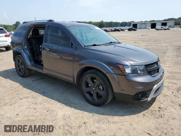 2020 Dodge Journey Crossroad with VIN 3C4PDCGB2LT213230, listed as a Copart auction lot 69148995 with 123,722 mi miles and Salvage title. Bid and sale history available at DreamBid. Image 4.