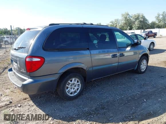 2001 Dodge Caravan Sport with VIN 2B4GP44321R318342, listed as a IAAI auction lot 42551746 with 159,480 mi miles and . Bid and sale history available at DreamBid. Image 4.
