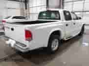 2001 Dodge Dakota Sport with VIN 1B7HL2AX21S259774, listed as a IAAI auction lot 41165907 with 311,576 mi miles and . Bid and sale history available at DreamBid. Image 4.