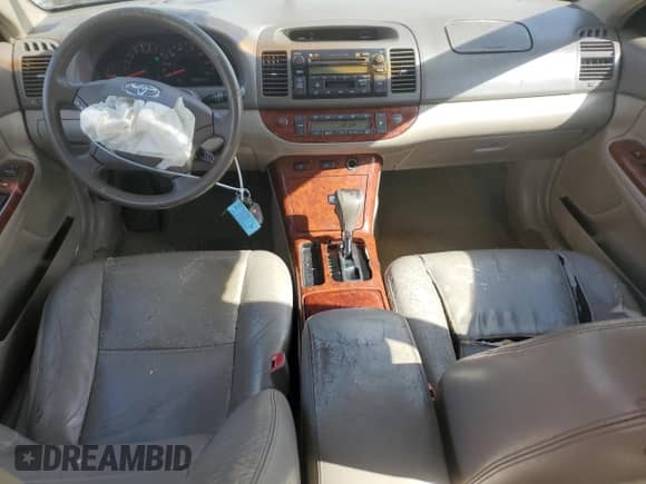 2006 Toyota Camry XLE с VIN 4T1BF30K96U624032, выставлен на аукционе Copart как лот 84063725 с пробегом 232 488 миль миль и Списание • Salvage title. История ставок и продаж доступна на DreamBid. Изображение 8.