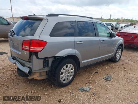 2016 Dodge Journey SE with VIN 3C4PDCAB2GT119637, listed as a IAAI auction lot 43104352 with 129,978 mi miles and . Bid and sale history available at DreamBid. Image 4.