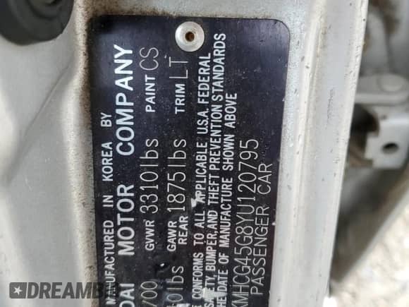 2000 Hyundai Accent with VIN KMHCG45G8YU120795, listed as a Copart auction lot 61005175 with 96,515 mi miles and Clean title. Bid and sale history available at DreamBid. Image 12.