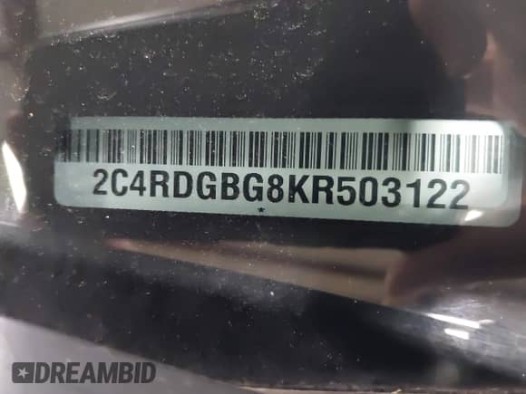 2019 Dodge Grand Caravan SE z VIN 2C4RDGBG8KR503122, wystawiony jako IAAI lot #41983380 z przebiegiem 128 692 mil mil oraz . Historia ofert i sprzedaży dostępna na DreamBid. Obrazek 9.