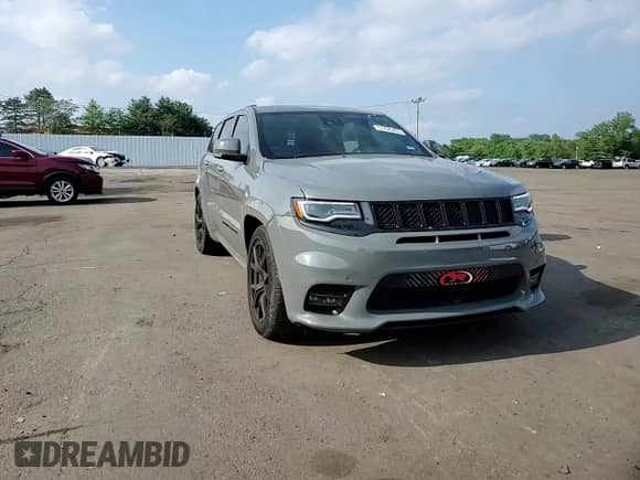 2020 Jeep Grand Cherokee SRT with VIN 1C4RJFDJ8LC158048, listed as a Copart auction lot 57426205 with 52,979 mi miles and Salvage title. Bid and sale history available at DreamBid. Image 13.