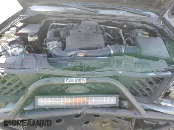 2007 Nissan Frontier SE z VIN 1N6AD07W57C463535, wystawiony jako Copart lot #84911344 z przebiegiem 173 896 mil mil oraz Szkoda całkowita • Salvage title. Historia ofert i sprzedaży dostępna na DreamBid. Obrazek 12.