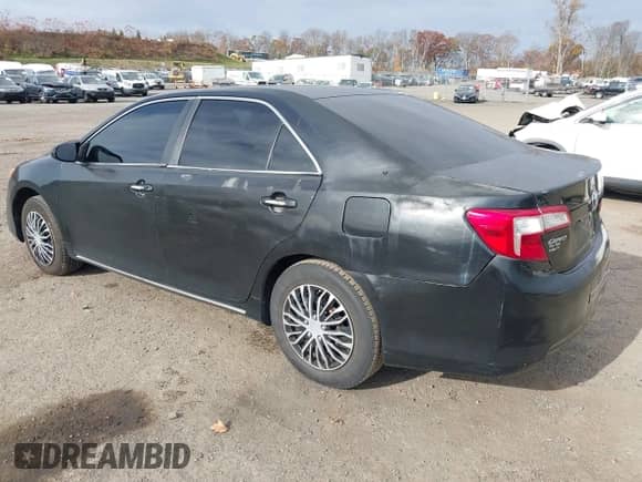 2014 Toyota Camry XLE with VIN 4T4BF1FK2ER354562, listed as a IAAI auction lot 43554838 with 197,062 mi miles and . Bid and sale history available at DreamBid. Image 3.