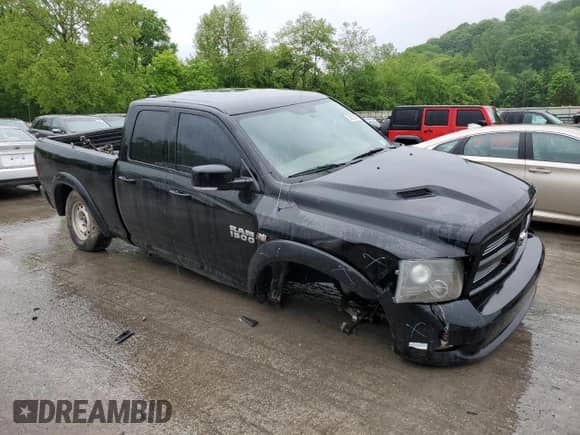 2012 Ram 1500 Sport with VIN 1C6RD7HT0CS345113, listed as a Copart auction lot 56533355 with 146,767 mi miles and Salvage title. Bid and sale history available at DreamBid. Image 4.